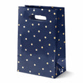 Sac cadeau 26 x 12 x 32 cm en papier bleu marine à pois dorés avec poignées découpées